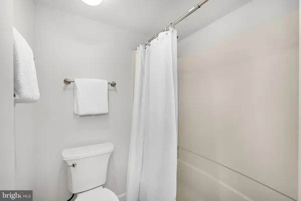 a bathroom with a double vanity sink and mirror