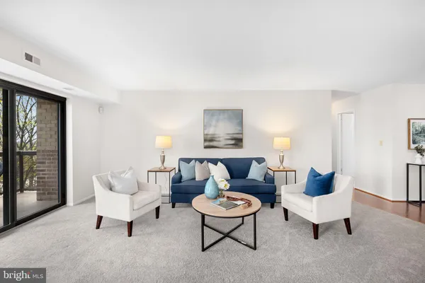 a view of a two chairs in the balcony