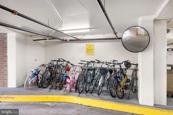 a living room with furniture pool table and window