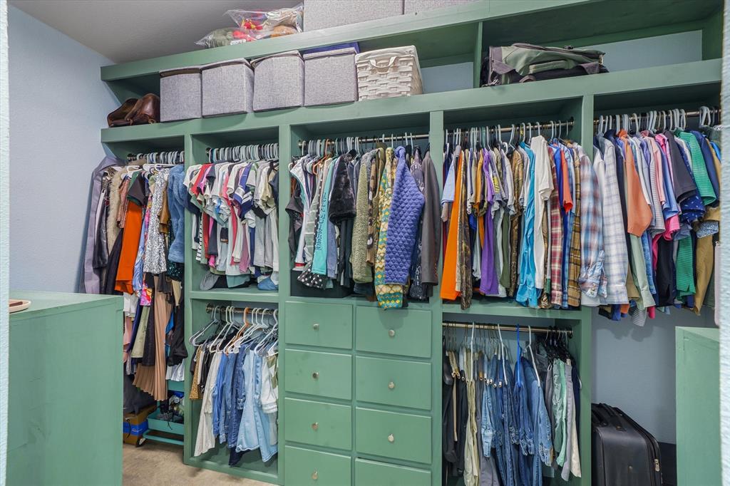 1026 VZ County Road Canton, TX 75103 - Photo 15 of 40 a view of walk in closet with clothes and shoes