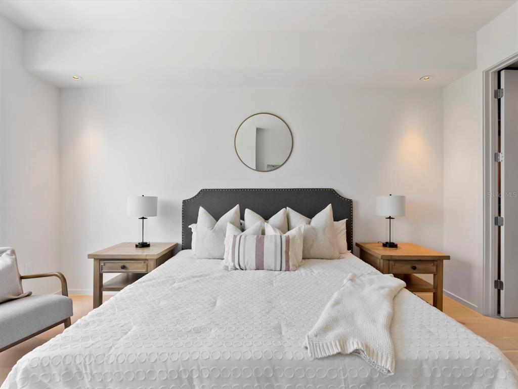 1020 Sunset Point Road, Unit 213 Clearwater, FL 33755 - Photo 25 of 42 a bedroom with bed and window