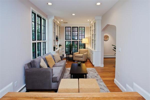25 Lancaster Road Newton, MA 02458 - Photo 3 of 10 a living room with furniture and large window
