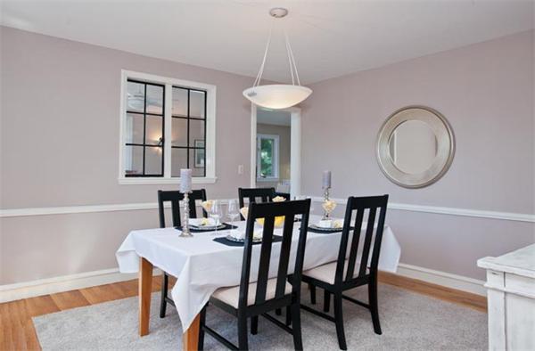 25 Lancaster Road Newton, MA 02458 - Photo 5 of 10 a view of a dining room with furniture and a chandelier