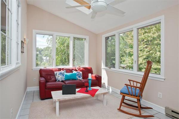 25 Lancaster Road Newton, MA 02458 - Photo 9 of 10 a living room with furniture and a window