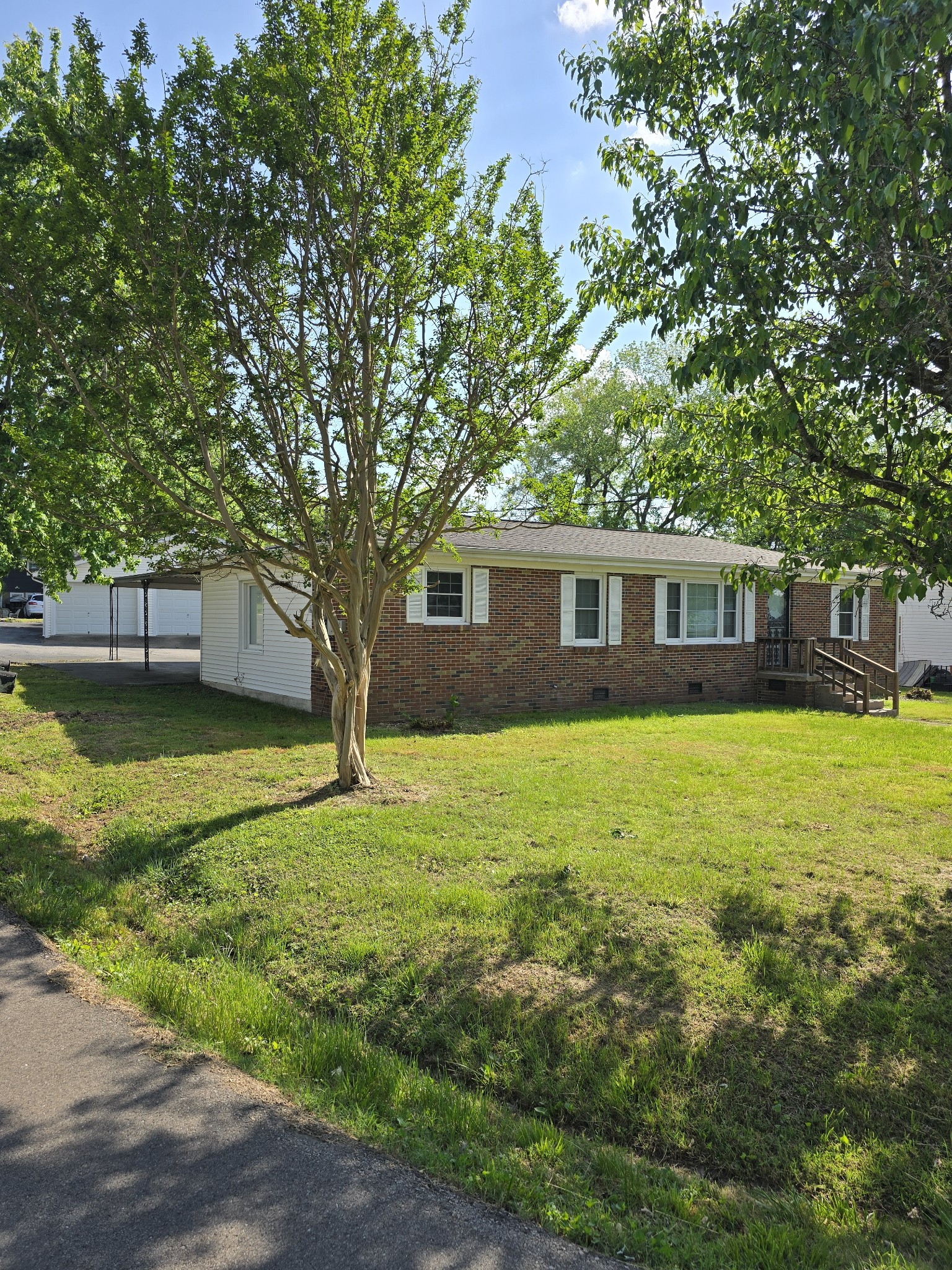 a house view with a garden space