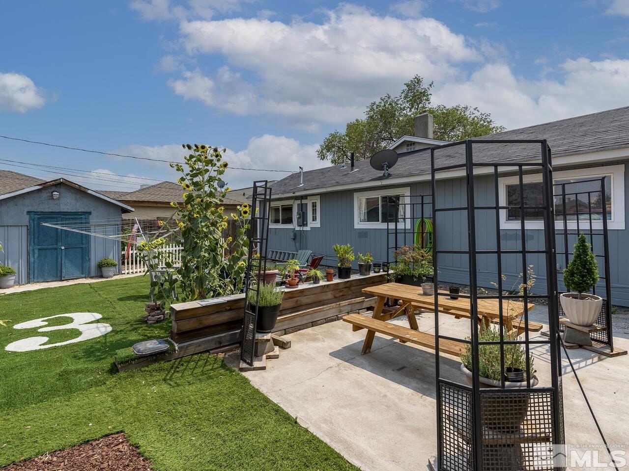 775 Aitken Street Reno, NV 89502 - Photo 21 of 21 a house view with a sitting space garden and outdoor seating