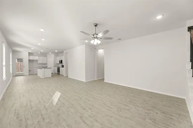 a view of kitchen and windows