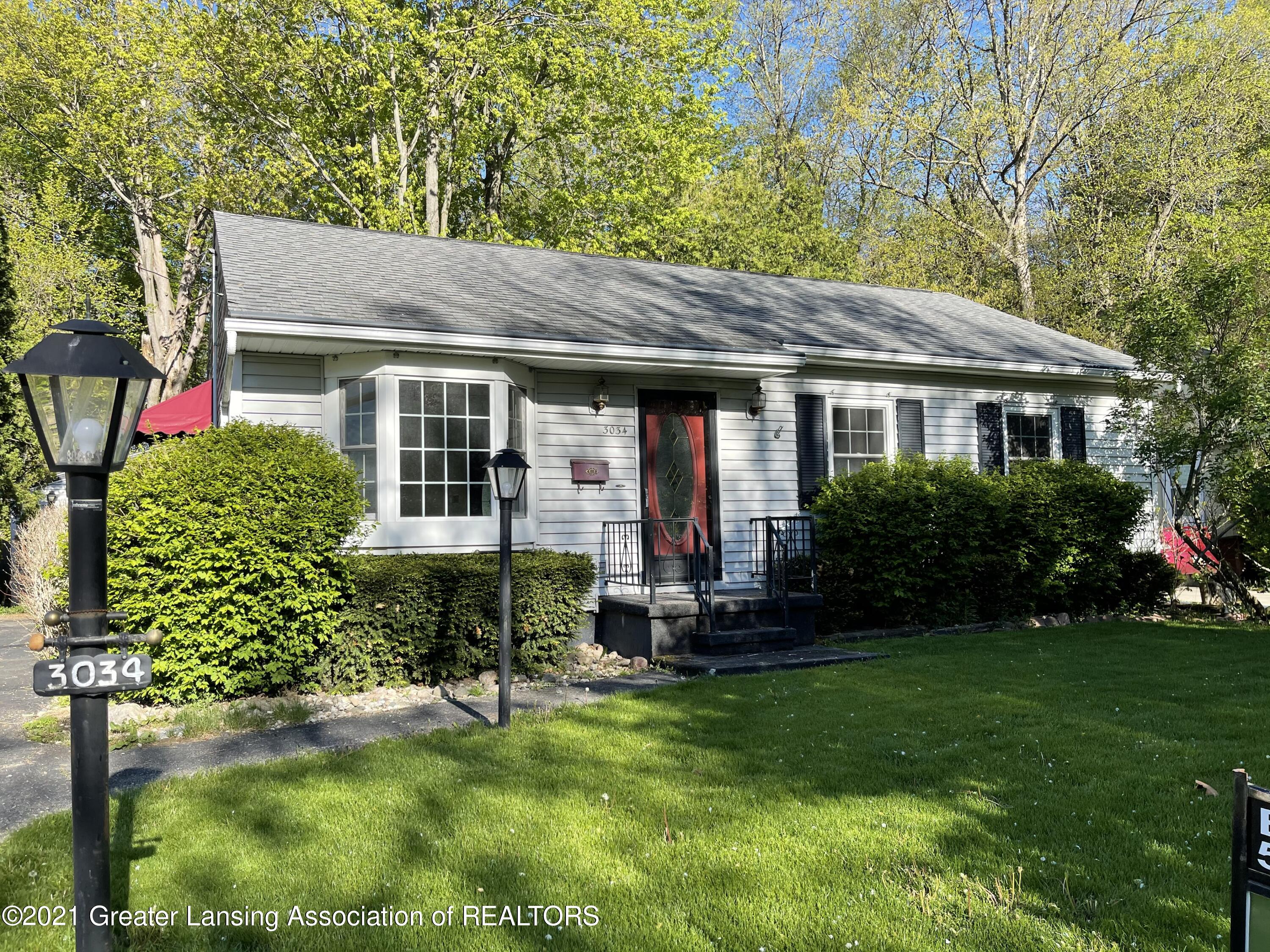 3034 Sunderland Road Lansing, MI 48911 - Photo 1 of 20 Front