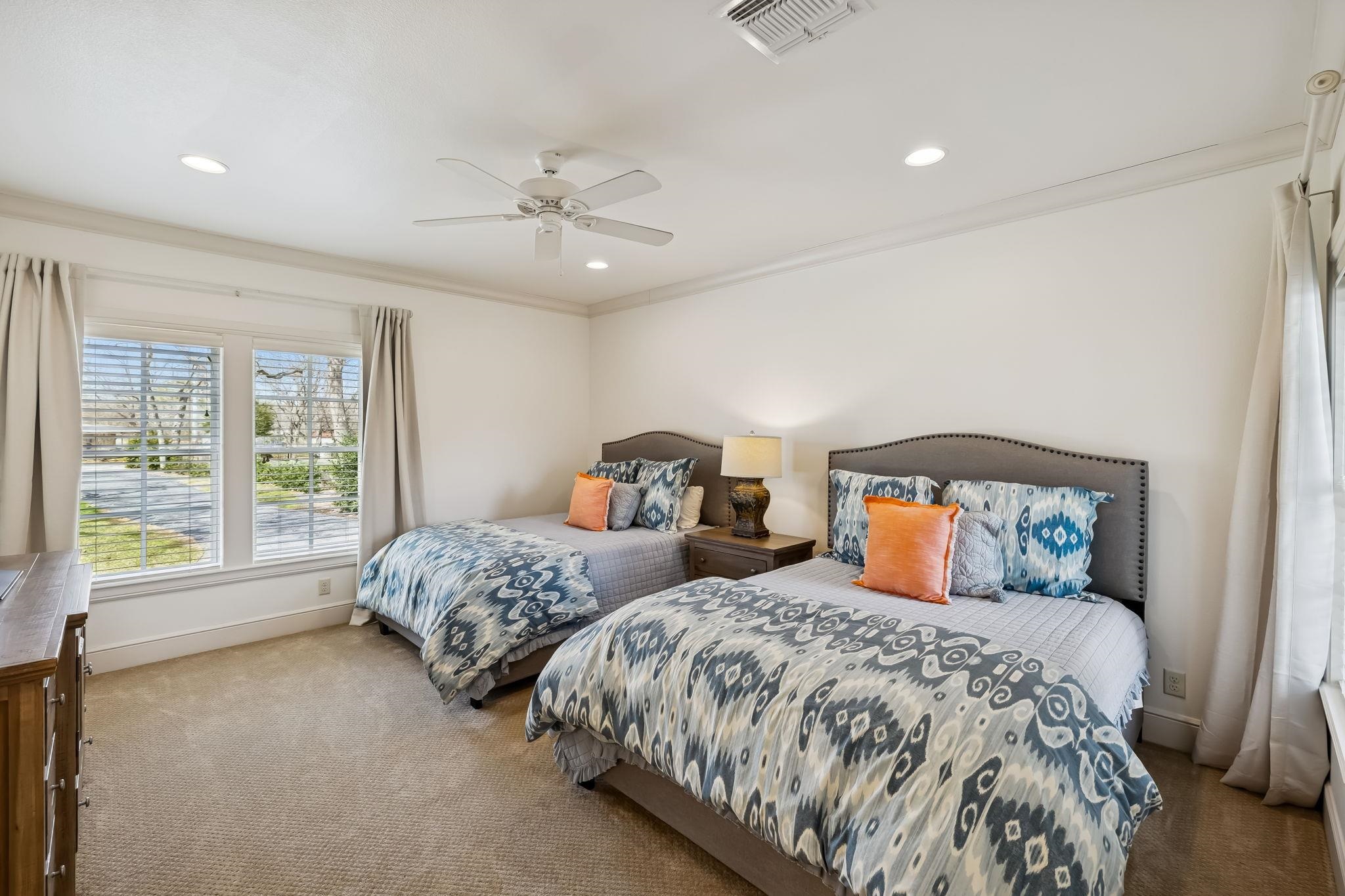 2319 Terminal Loop Road McQueeney, TX 78123 - Photo 17 of 30 a bedroom with two beds and a large window