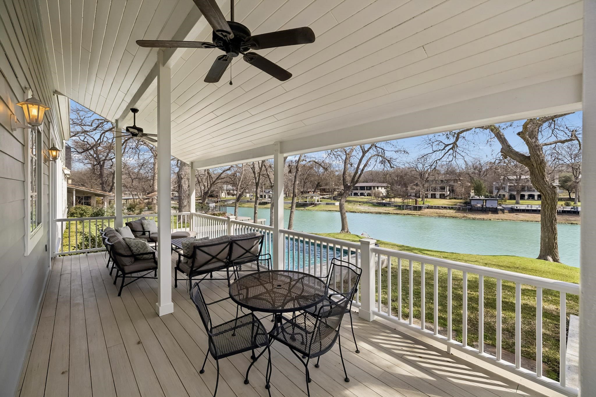 2319 Terminal Loop Road McQueeney, TX 78123 - Photo 26 of 29 a view of a chairs and table on the deck