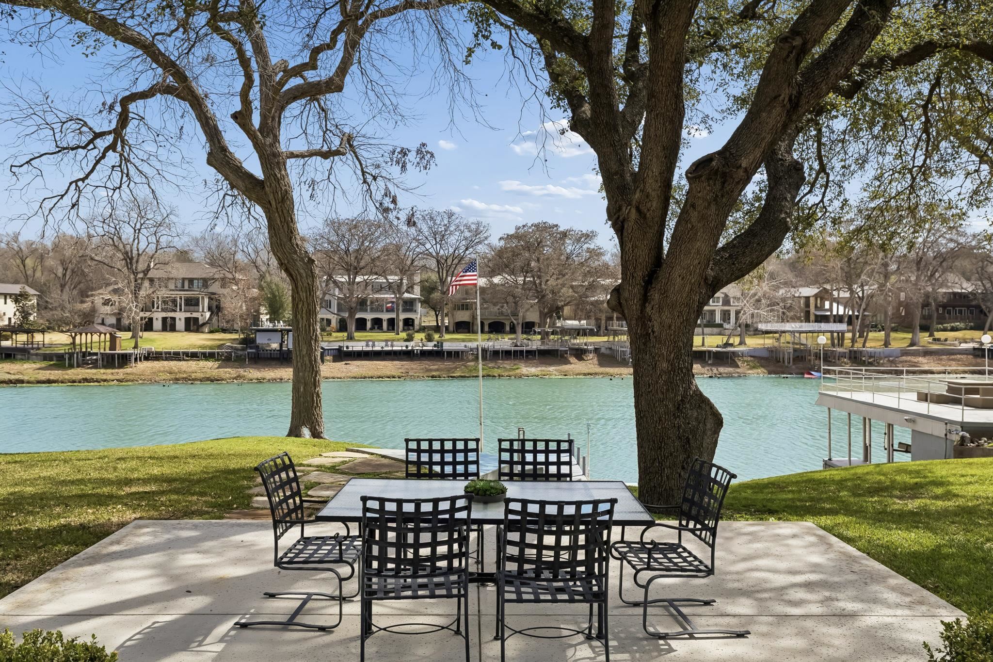 2319 Terminal Loop Road McQueeney, TX 78123 - Photo 28 of 30 a view of a lake with table and chairs