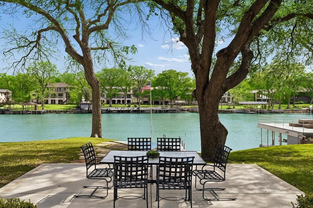 2319 Terminal Loop Road McQueeney, TX 78123 - Photo 28 of 29 a view of a lake with table and chairs