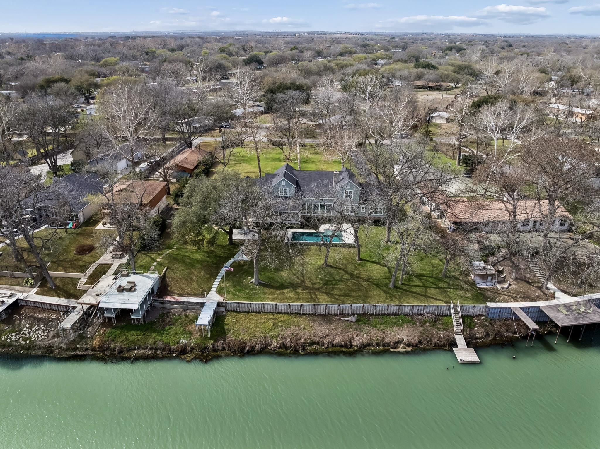 2319 Terminal Loop Road McQueeney, TX 78123 - Photo 30 of 30 an aerial view of a house with a garden and lake view