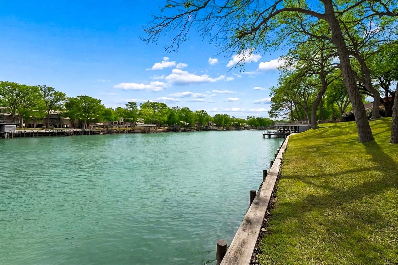 2319 Terminal Loop Road McQueeney, TX 78123 - Photo 4 of 29 a view of a lake with a yard