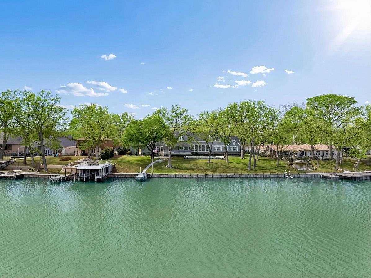 2319 Terminal Loop Road McQueeney, TX 78123 - Photo 5 of 29 a view of a swimming pool with outdoor seating and yard