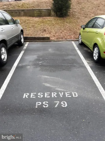 a view of a car parked in a parking lot