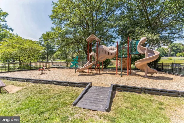 a city street lined with buildings and cars