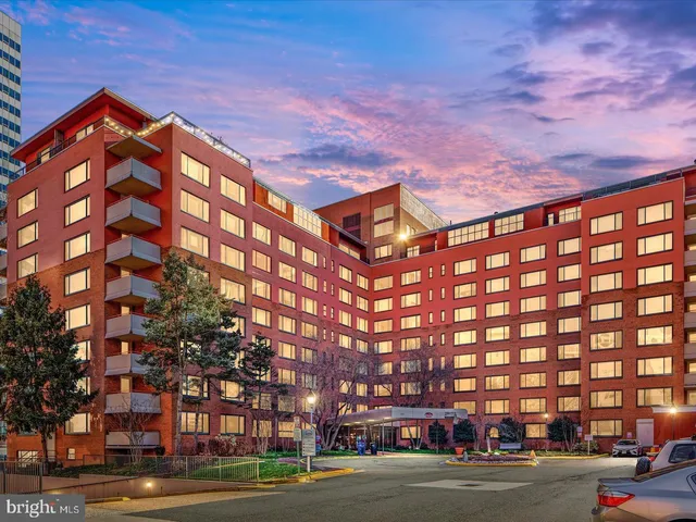 a view of a chairs and table in the patio