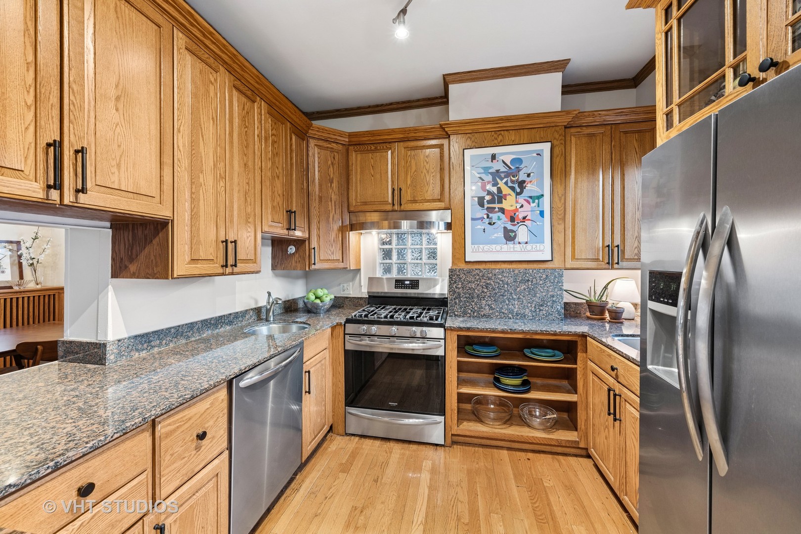 309 Wesley Avenue Oak Park, IL 60302 - Photo 15 of 56 a kitchen with stainless steel appliances granite countertop a stove and a refrigerator