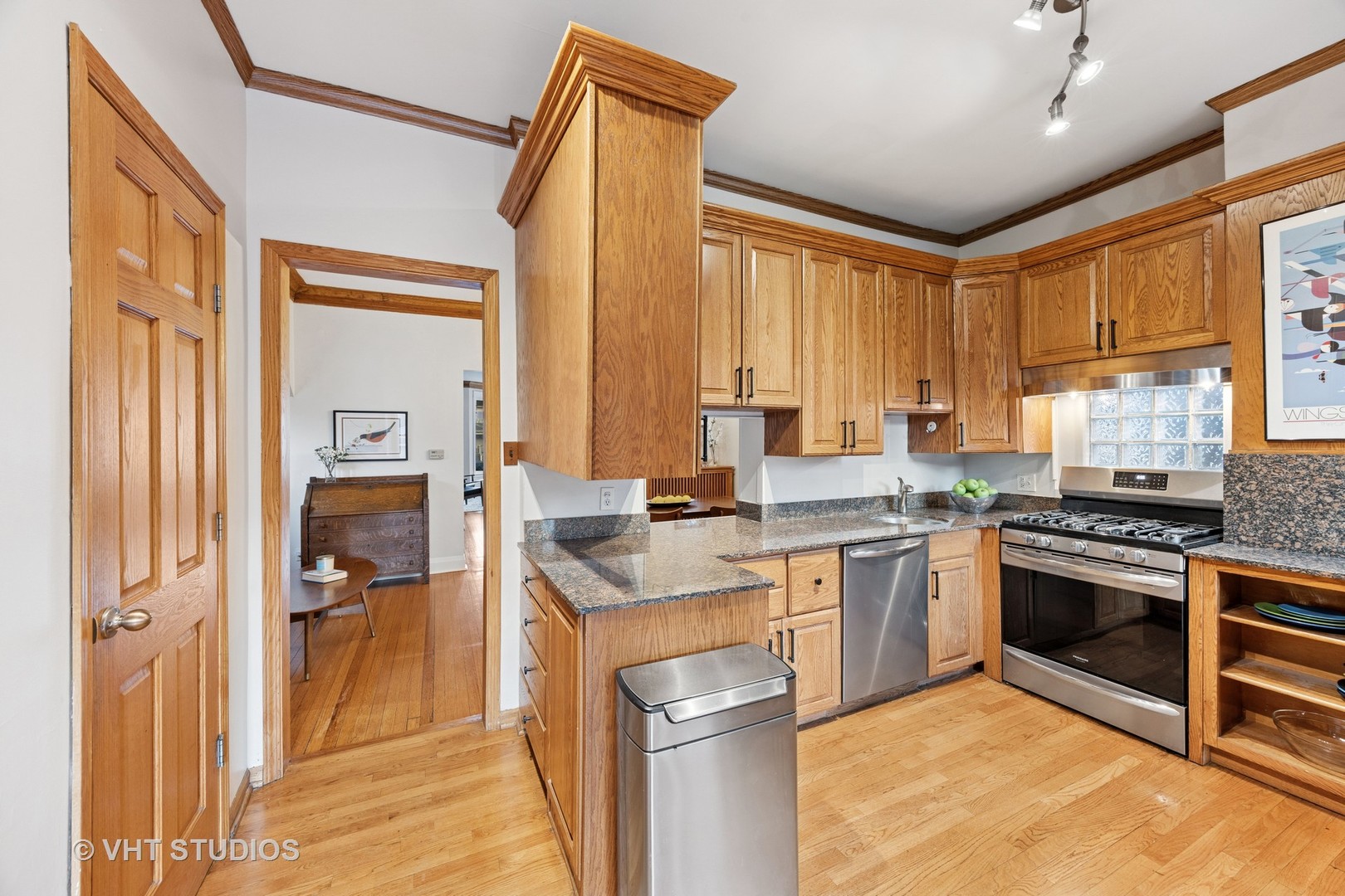 309 Wesley Avenue Oak Park, IL 60302 - Photo 18 of 56 a kitchen with a sink stove and cabinets