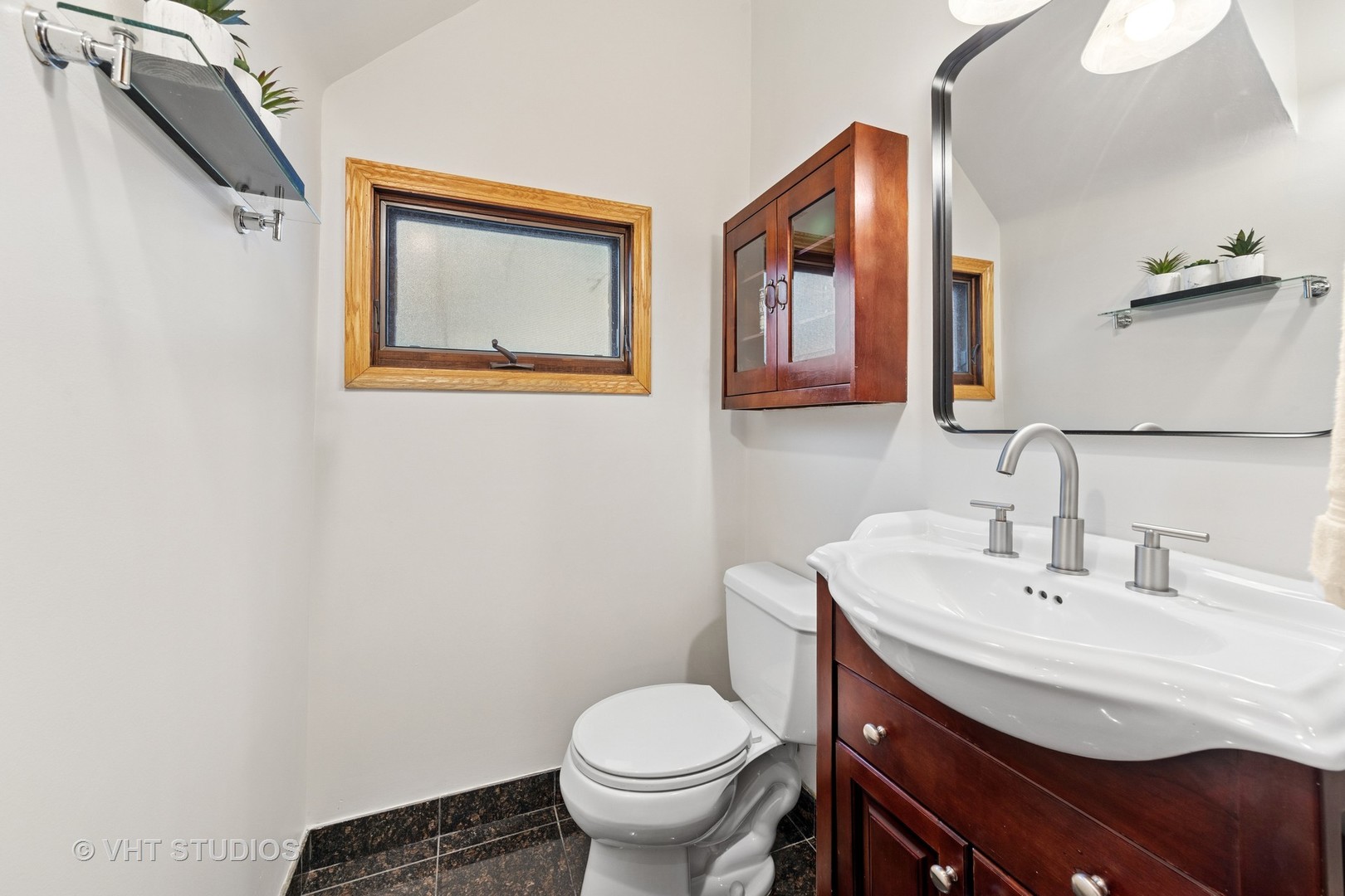 309 Wesley Avenue Oak Park, IL 60302 - Photo 23 of 56 a bathroom with a toilet a sink and mirror