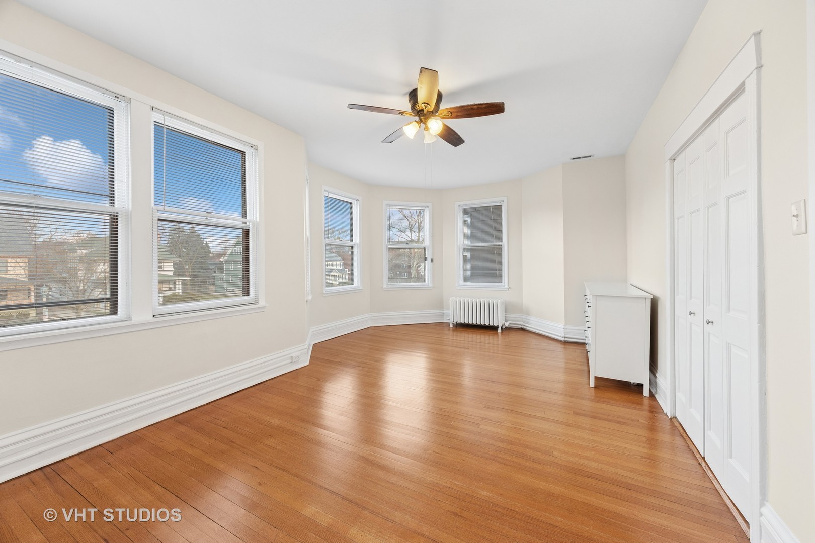 309 Wesley Avenue Oak Park, IL 60302 - Photo 27 of 56 a view of empty room with wooden floor and fan