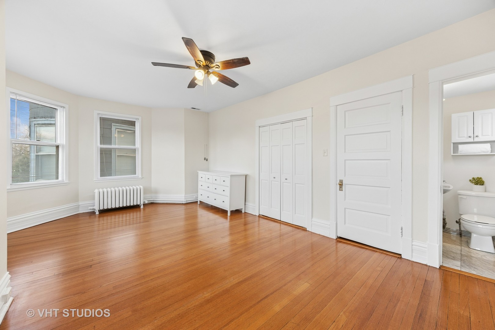 309 Wesley Avenue Oak Park, IL 60302 - Photo 28 of 56 a view of empty room with wooden floor and fan