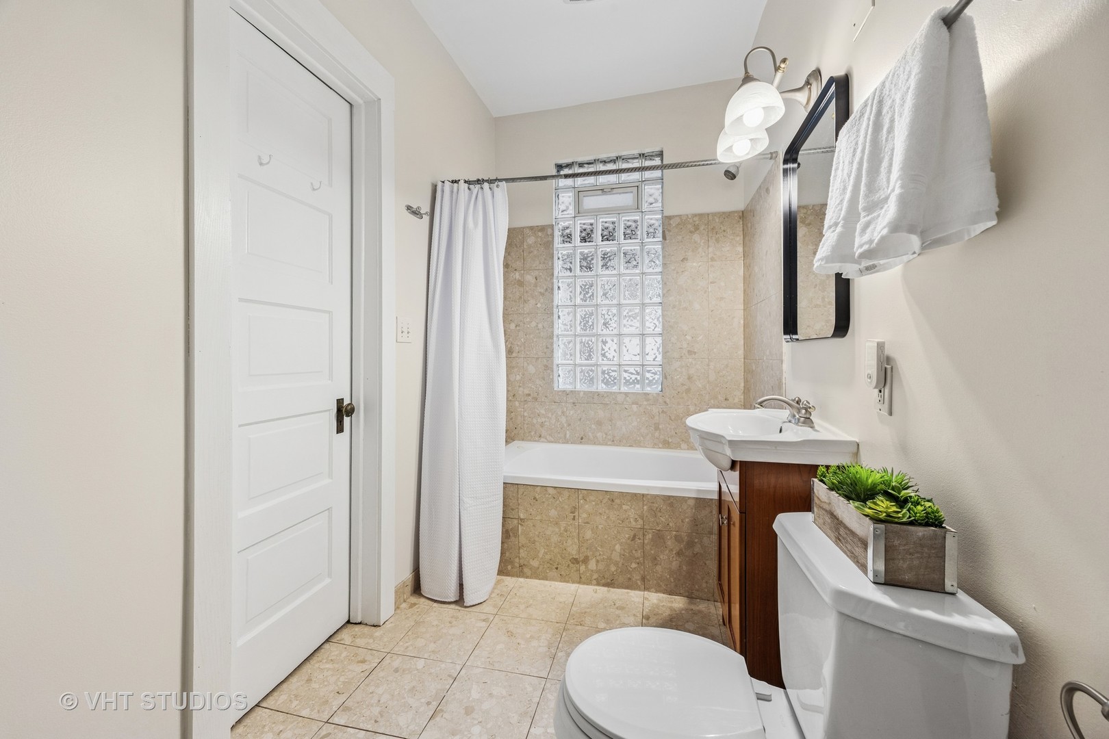 309 Wesley Avenue Oak Park, IL 60302 - Photo 34 of 56 a bathroom with a sink toilet and shower