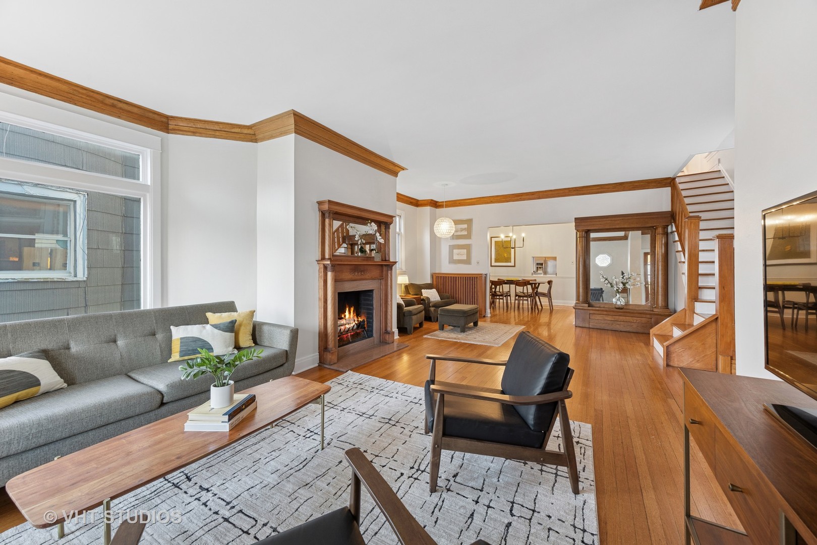309 Wesley Avenue Oak Park, IL 60302 - Photo 5 of 56 a living room with furniture and a fireplace
