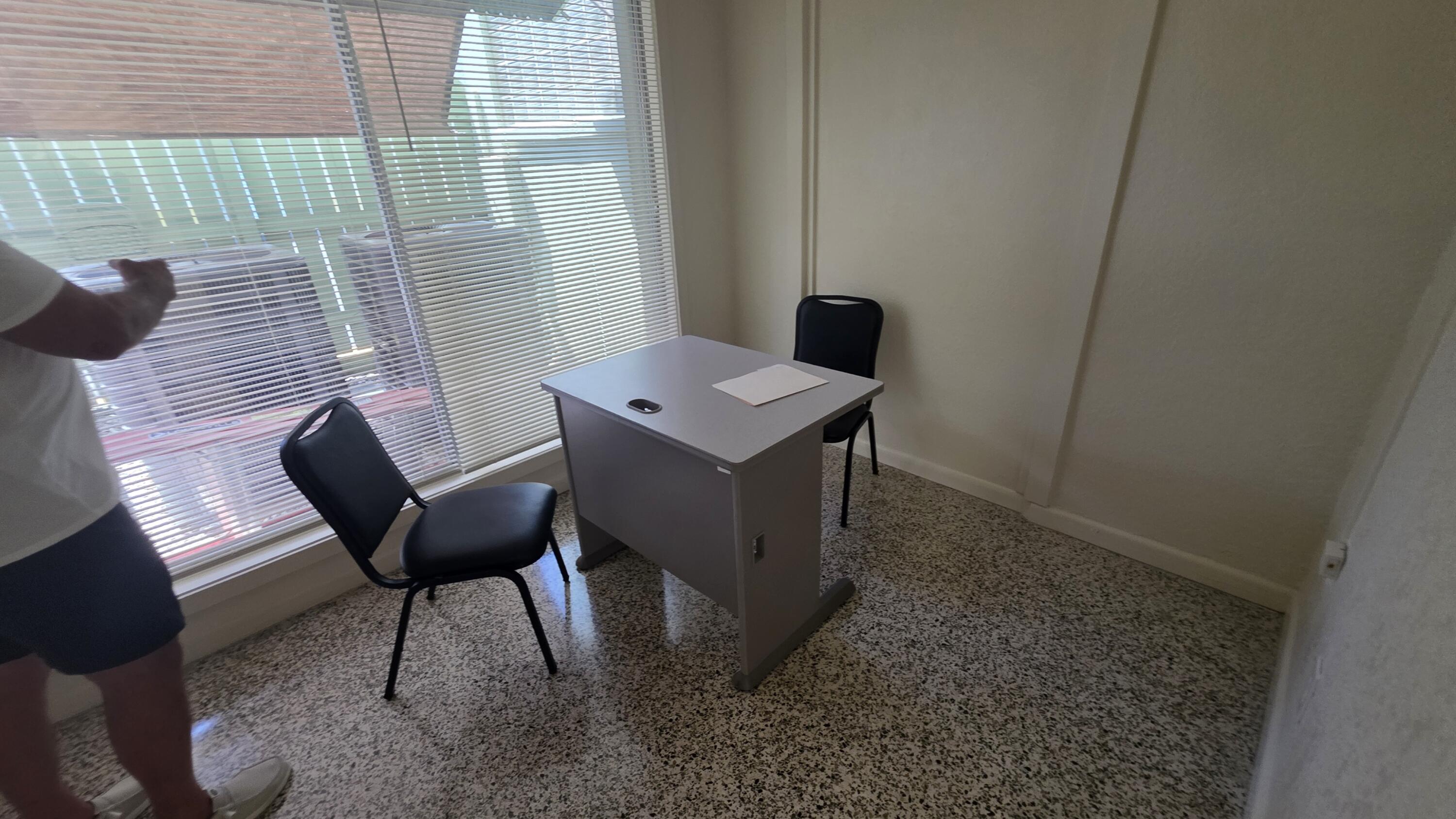 117 North 5th Street Fort Pierce, FL 34950 - Photo 16 of 30 a workspace room with furniture and a window