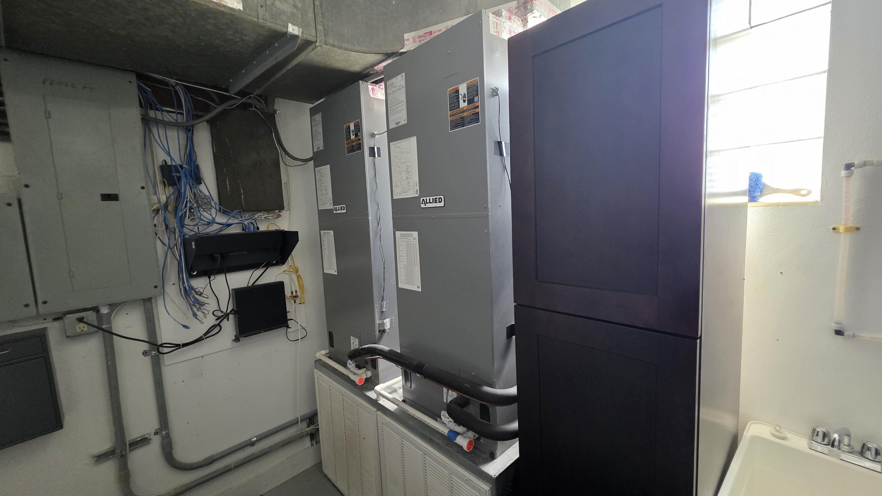 117 North 5th Street Fort Pierce, FL 34950 - Photo 19 of 30 a bathroom with a sink and a mirror