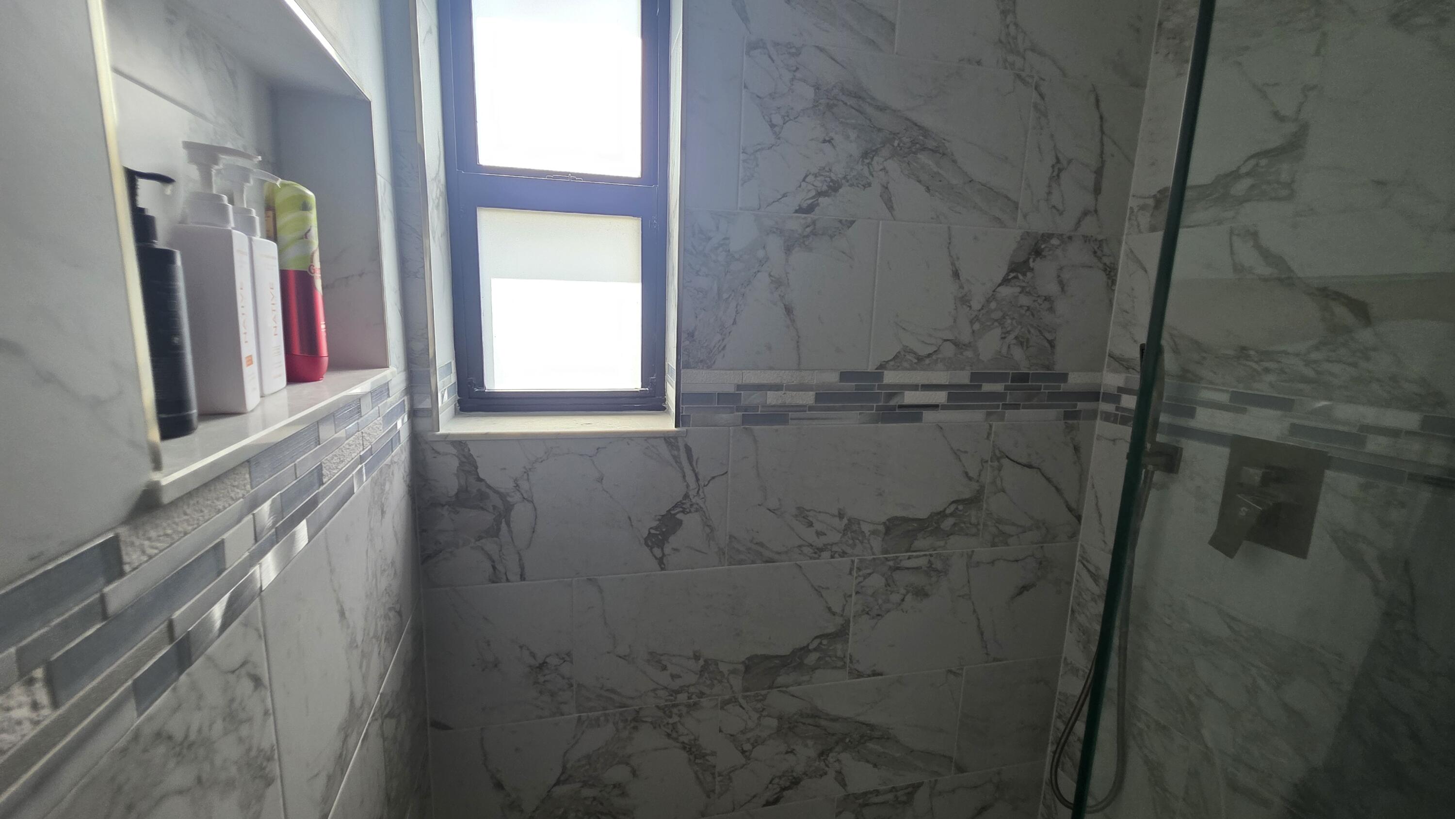 117 North 5th Street Fort Pierce, FL 34950 - Photo 23 of 30 a bathroom with a shower