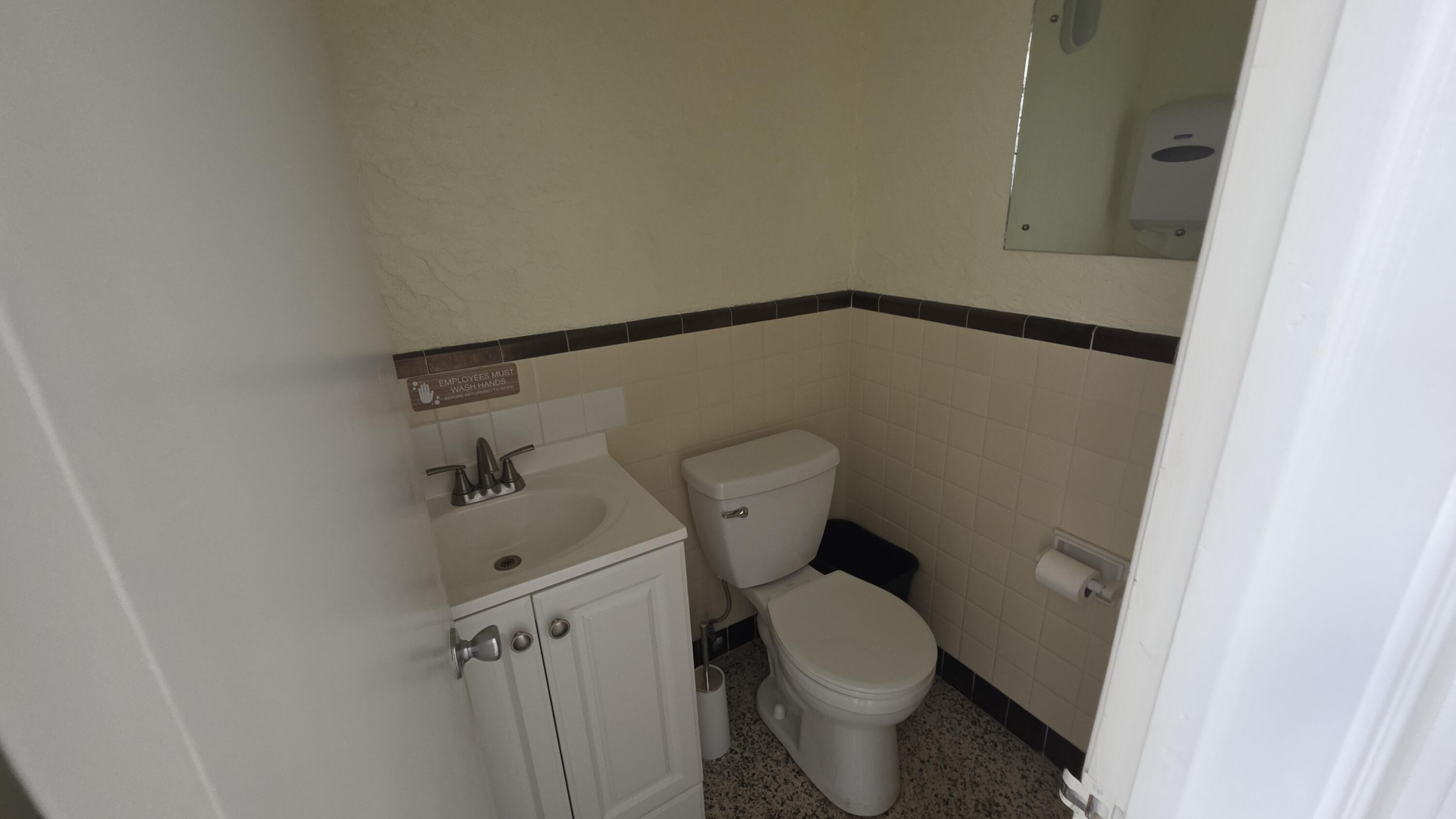 117 North 5th Street Fort Pierce, FL 34950 - Photo 10 of 30 a bathroom with a toilet and a shower