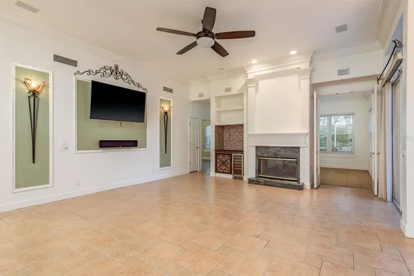 a large kitchen with cabinets and stainless steel appliances