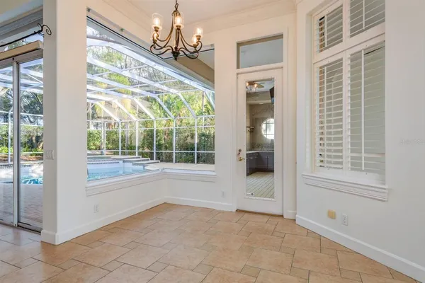 a kitchen with a sink and refrigerator