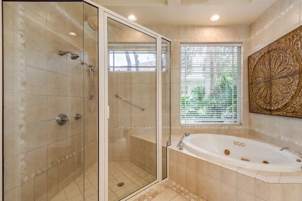 a view of a room with wooden floor and natural light