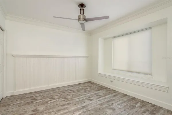 a view of a swimming pool with a yard