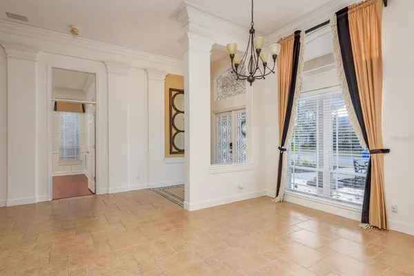a view of an empty room with stairs