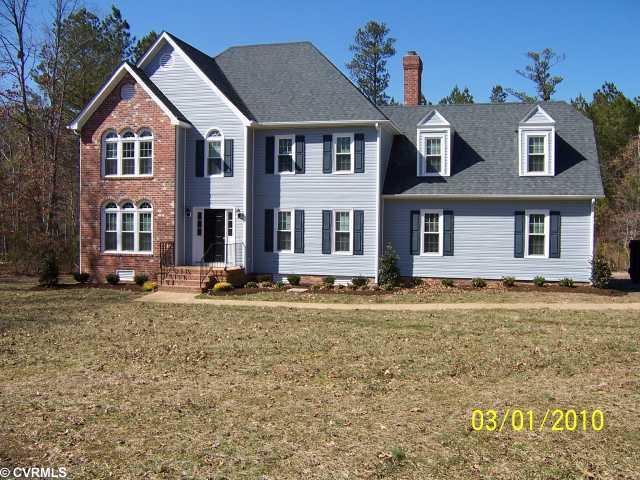 Exterior Front - Professionally landscaped...