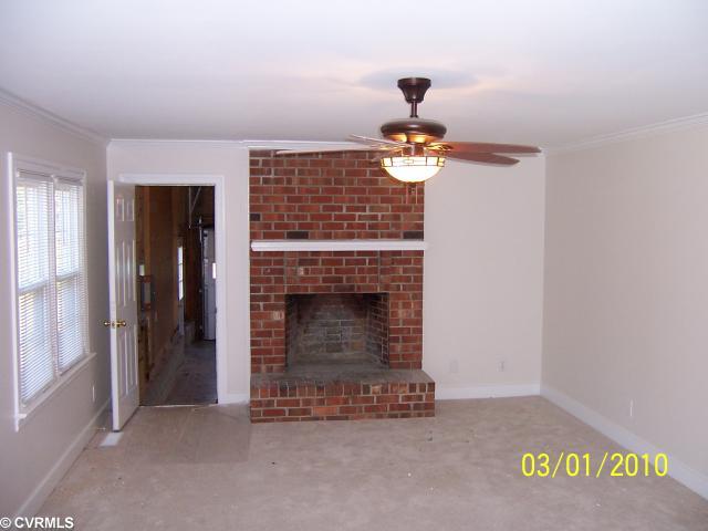 13430 Carters Way Road Chesterfield, VA 23838 - Photo 6 of 12 Den/Family/Great Room - Den with fireplace. Entrance from garage and access to rear deck thru a new sliding door.
