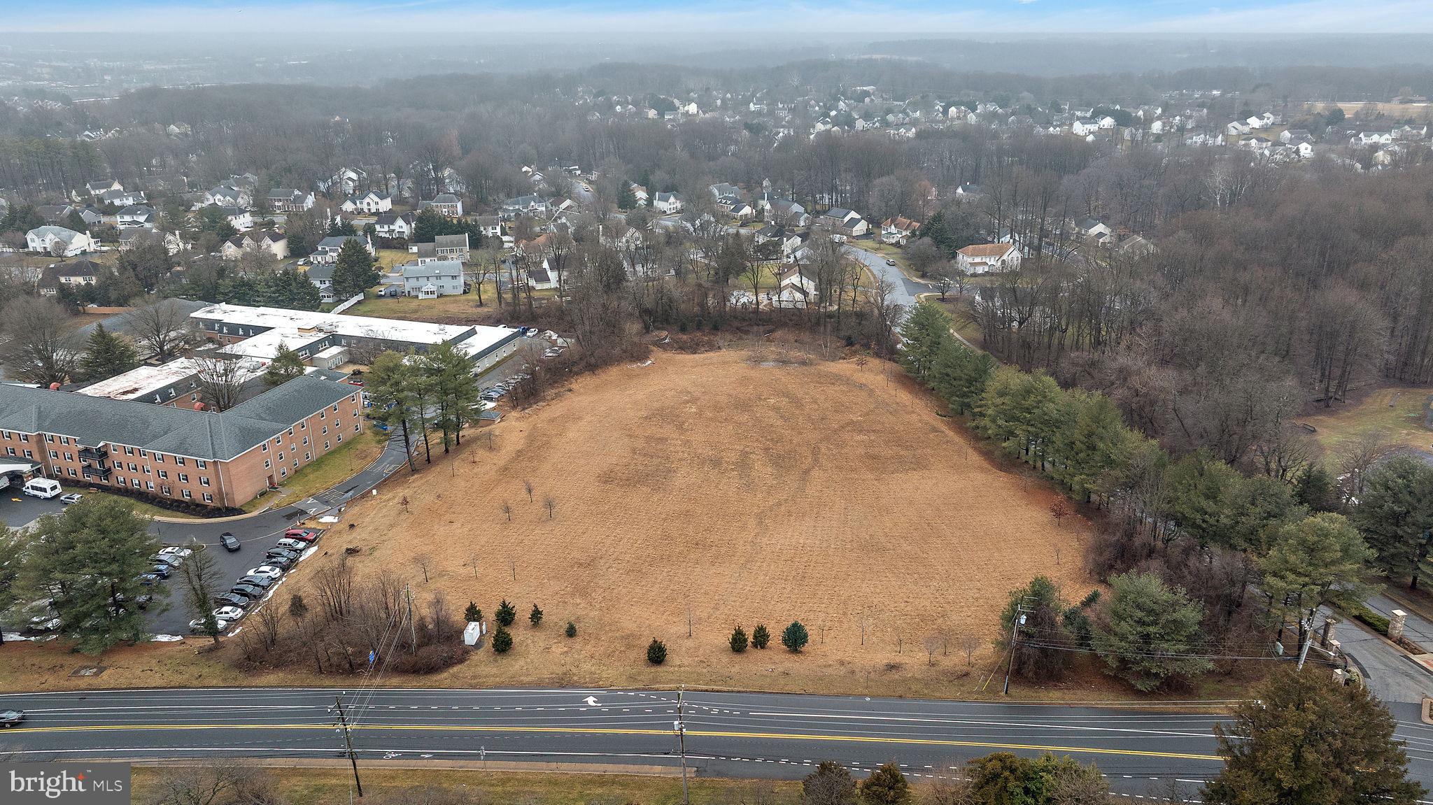 275 Possum Park Road Newark, DE 19711 - Photo 8 of 8 an aerial view of a residential apartment building with trees