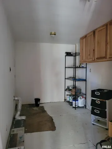 a bed room with a bed and furniture