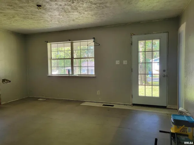 an empty room with a window