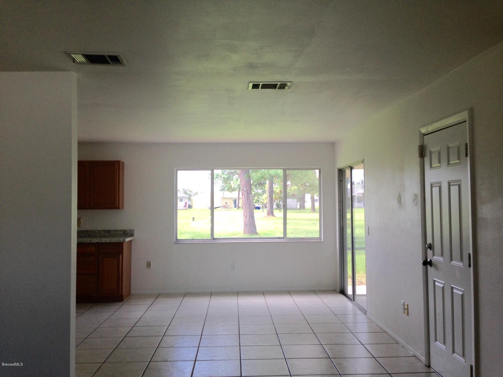 1220 Freil Road Northeast Palm Bay, FL 32905 - Photo 5 of 11 DINING ROOM