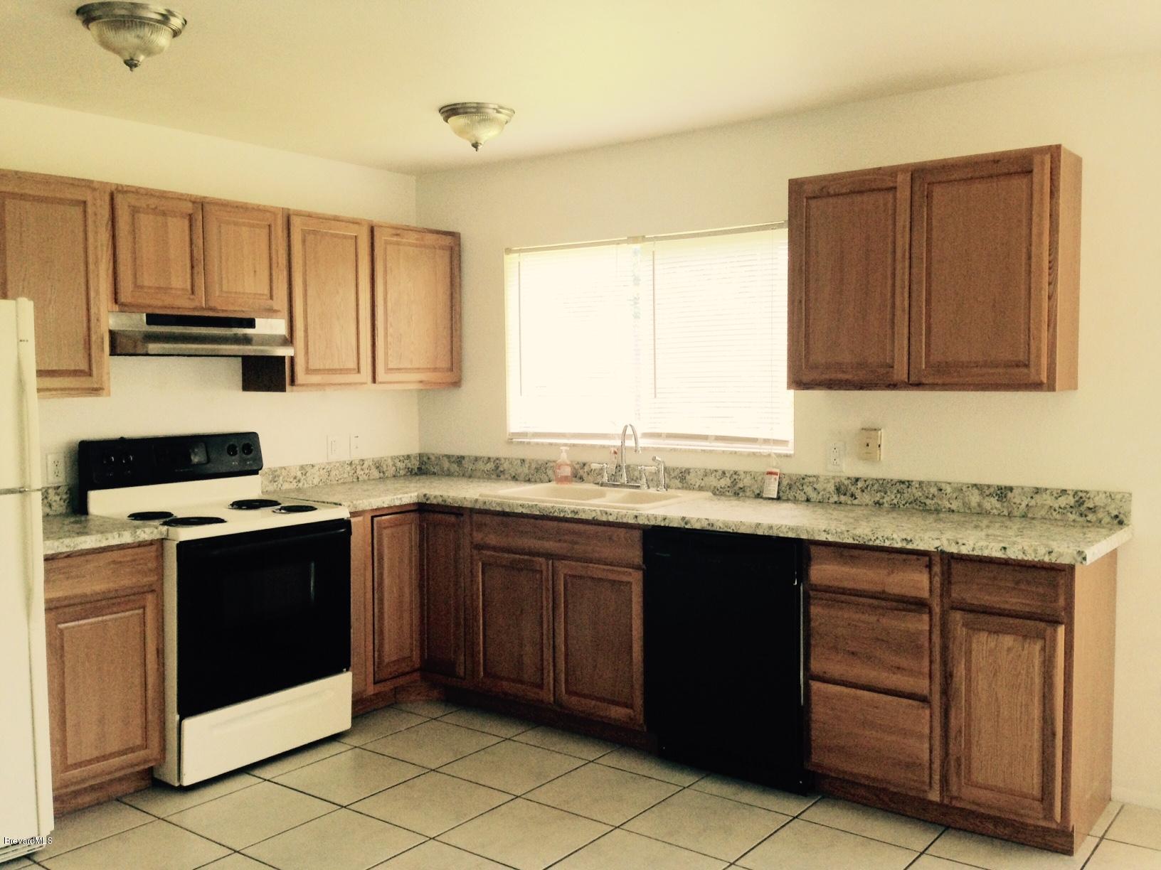 1220 Freil Road Northeast Palm Bay, FL 32905 - Photo 6 of 11 KITCHEN VIEW 1