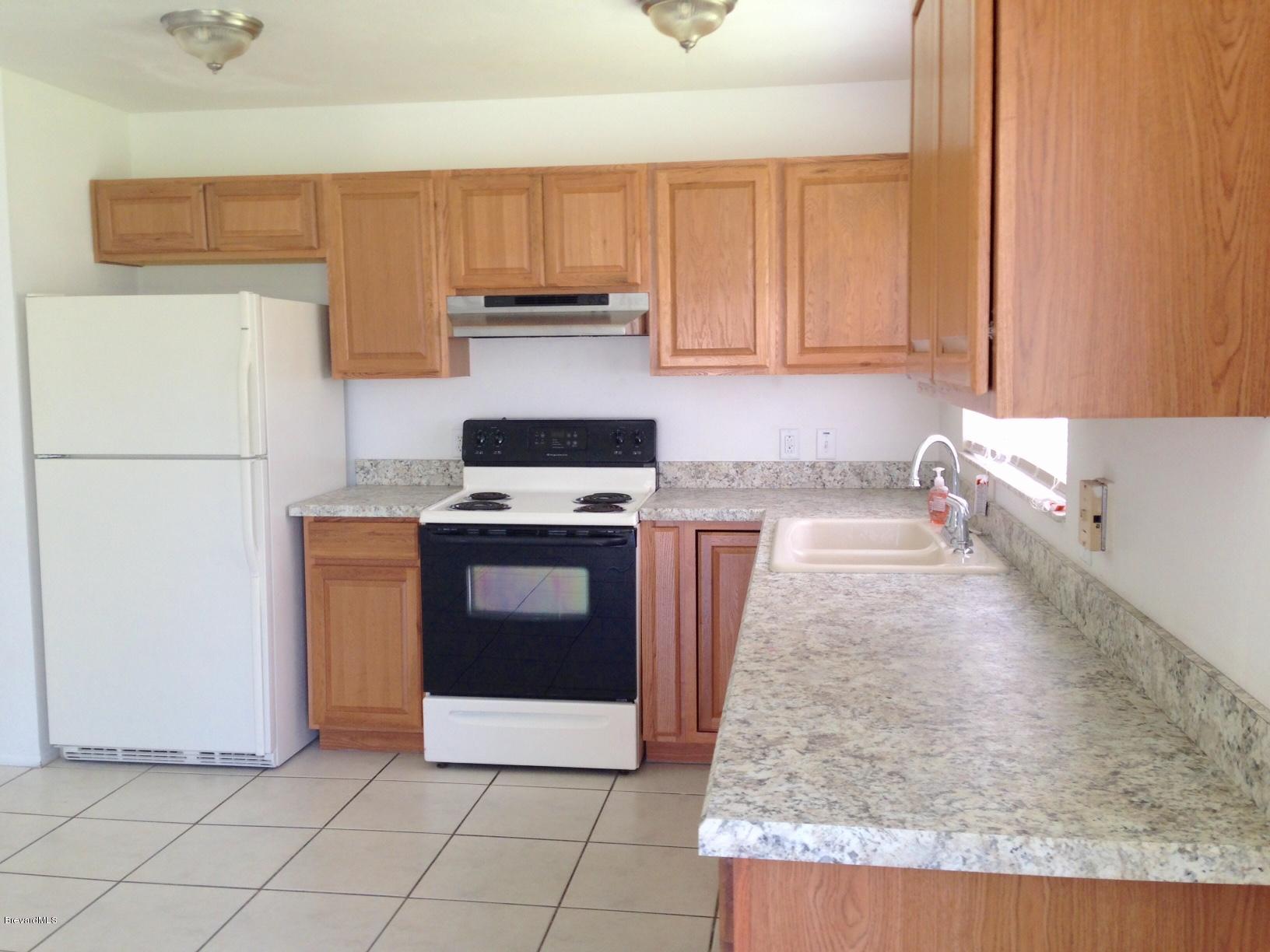 1220 Freil Road Northeast Palm Bay, FL 32905 - Photo 7 of 11 KITCHEN VIEW 2