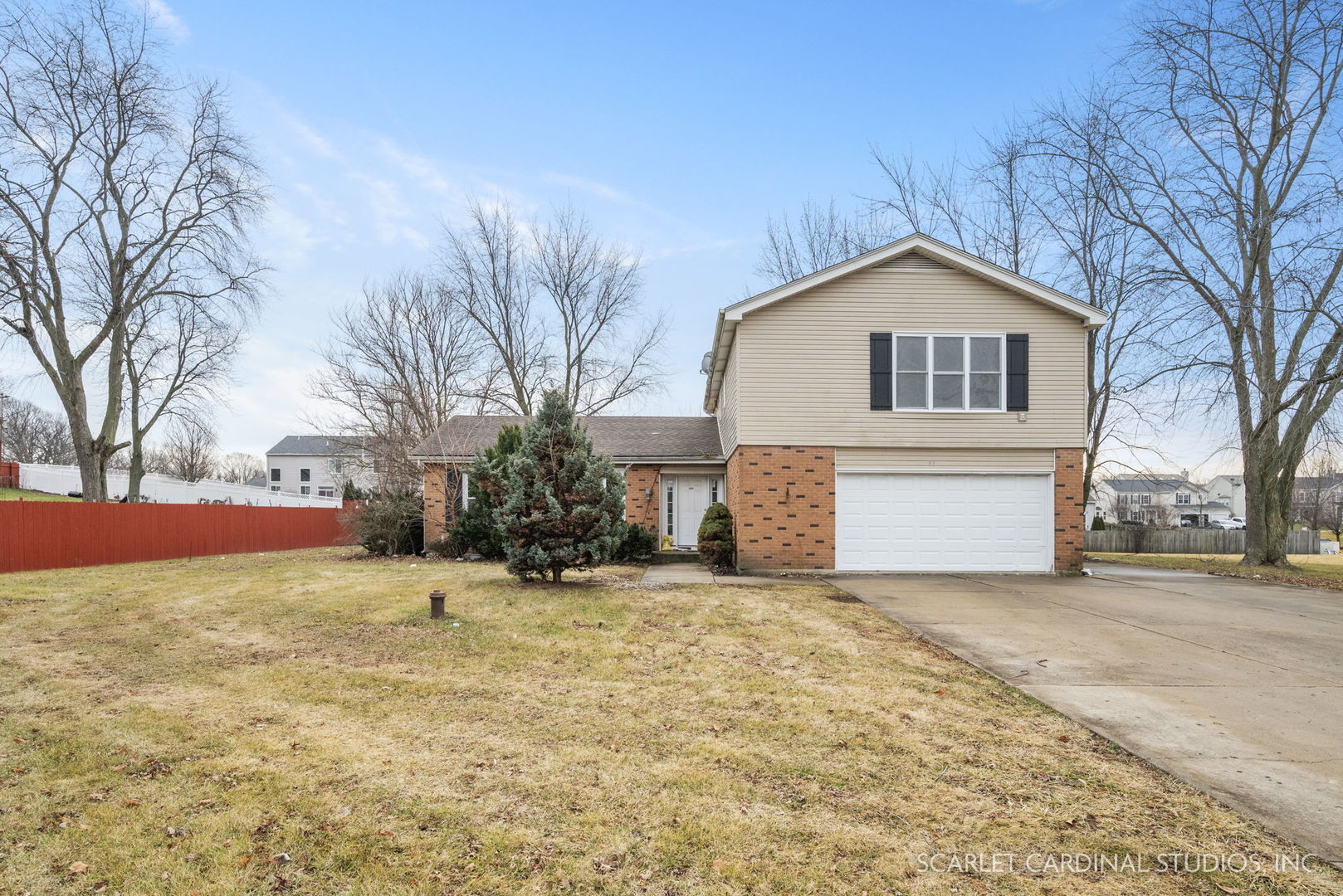 2151 Sheffer Road Aurora, IL 60502 - Photo 1 of 16 a front view of house with yard and trees