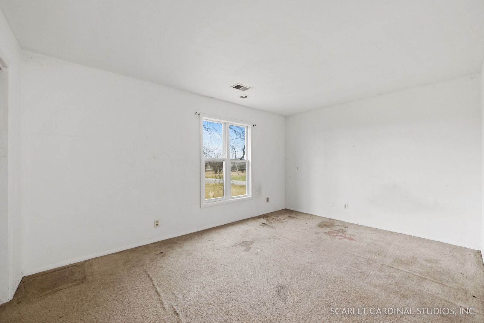 2151 Sheffer Road Aurora, IL 60502 - Photo 11 of 16 an empty room with a window