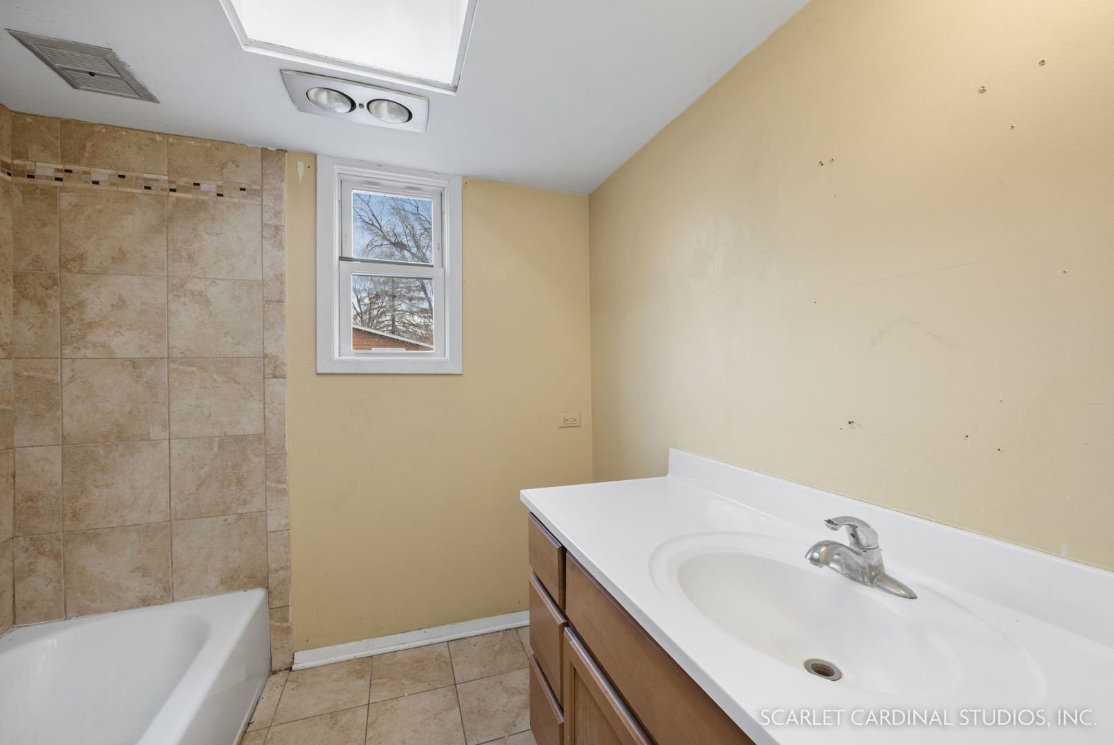 2151 Sheffer Road Aurora, IL 60502 - Photo 13 of 16 a bathroom with a sink a shower and a mirror