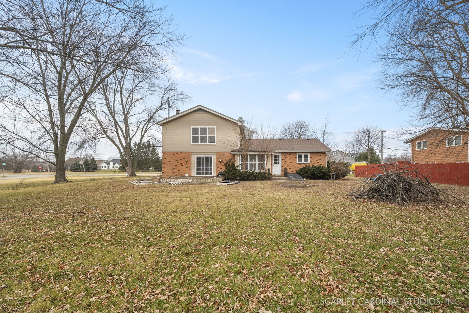 2151 Sheffer Road Aurora, IL 60502 - Photo 16 of 16 a front view of a house with yard and trees